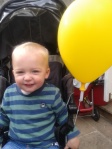 Conor with his balloon from mental health charity MIND